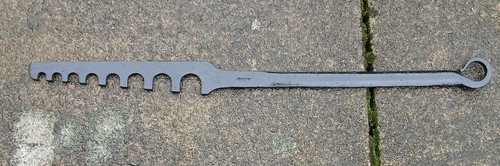 Antique cast iron spanner for